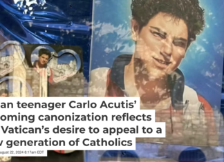 Carlo Acutis souvenirs displayed in a shop window in Assisi in June 2024. Michael Di Giovine, CC BY